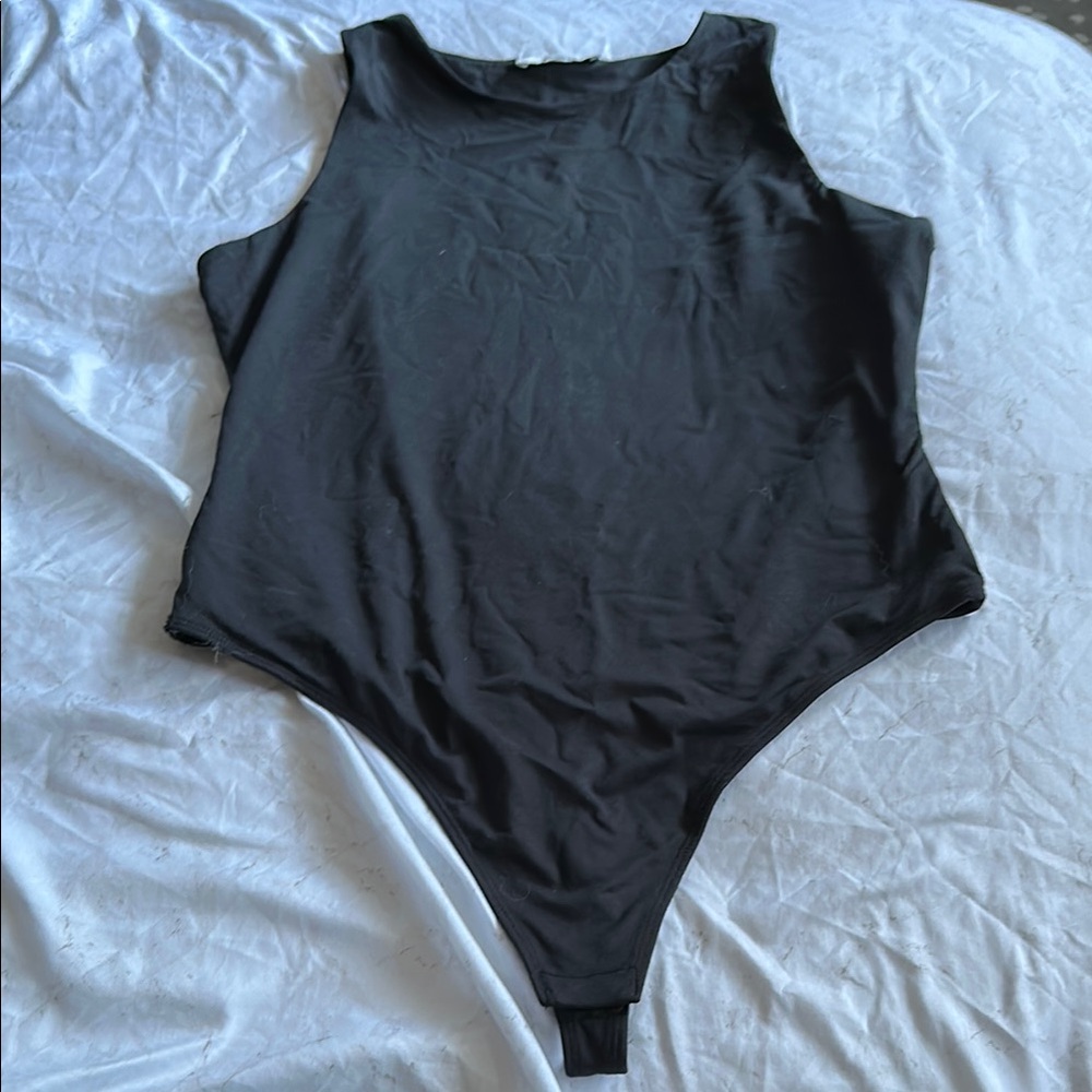 Ricki’s Black Sleeveless Bodysuit
